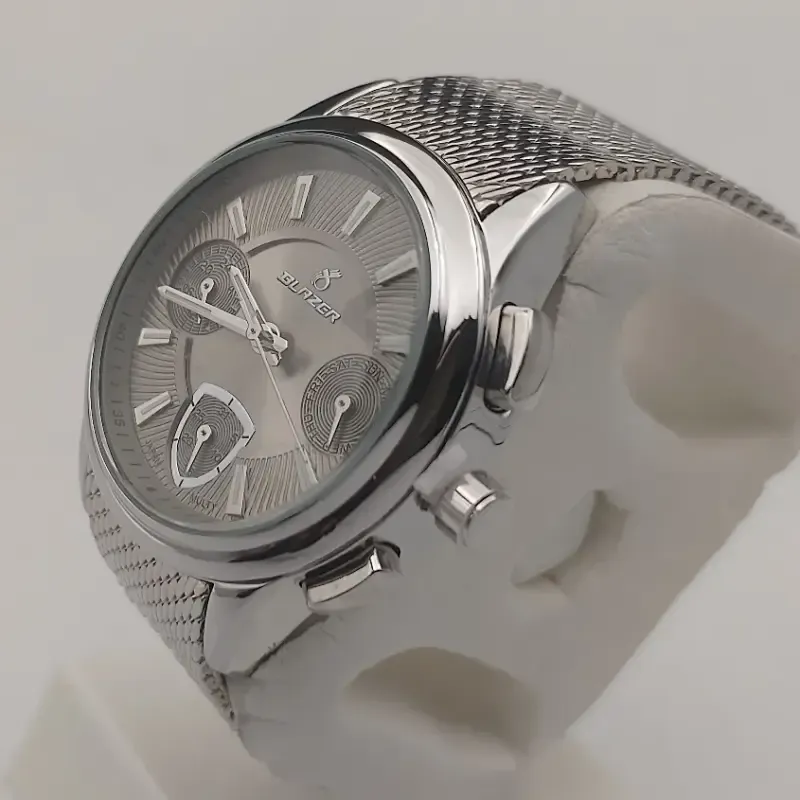 ساعت مچی زنانه بلیزر استیل صفحه طوسی بند حصیری موتور ژاپن